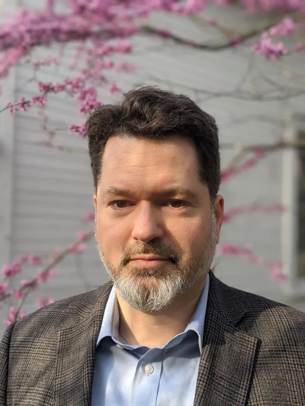 Prof. Dew headshot